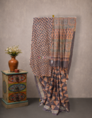 Brick Red Ajrakh Tussar Saree with Geometric Floral Motifs | Mitranis